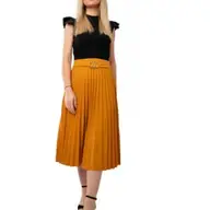 10 look-uri cu fusta plisata pentru toamna/iarna aceasta