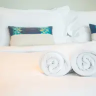 Top motive pentru care să investești în lenjerii de pat de calitate pentru hotel