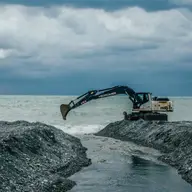 Funcționalitatea unui buldoexcavator și istoria sa