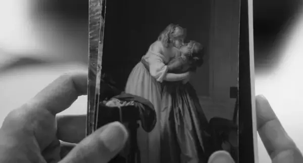 Two People Exchanging Saliva